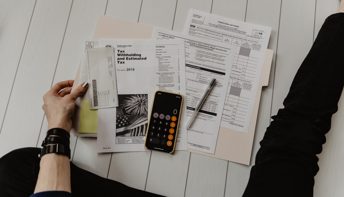 Documents and pen on a desk for application support